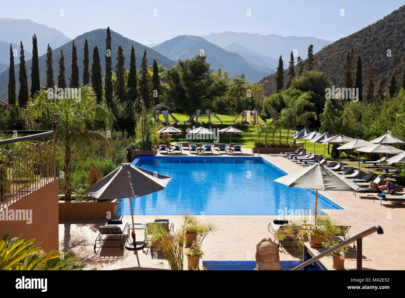 Kasbah Tamadot, hotel complex with a pool near Asni with a view of the Atlas Mountains, Marrakesh, Morocco Stock Photo