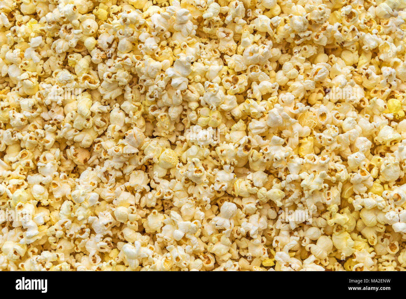 Popcorn texture background. Yellow sweet popcorn. Pattern Stock Photo