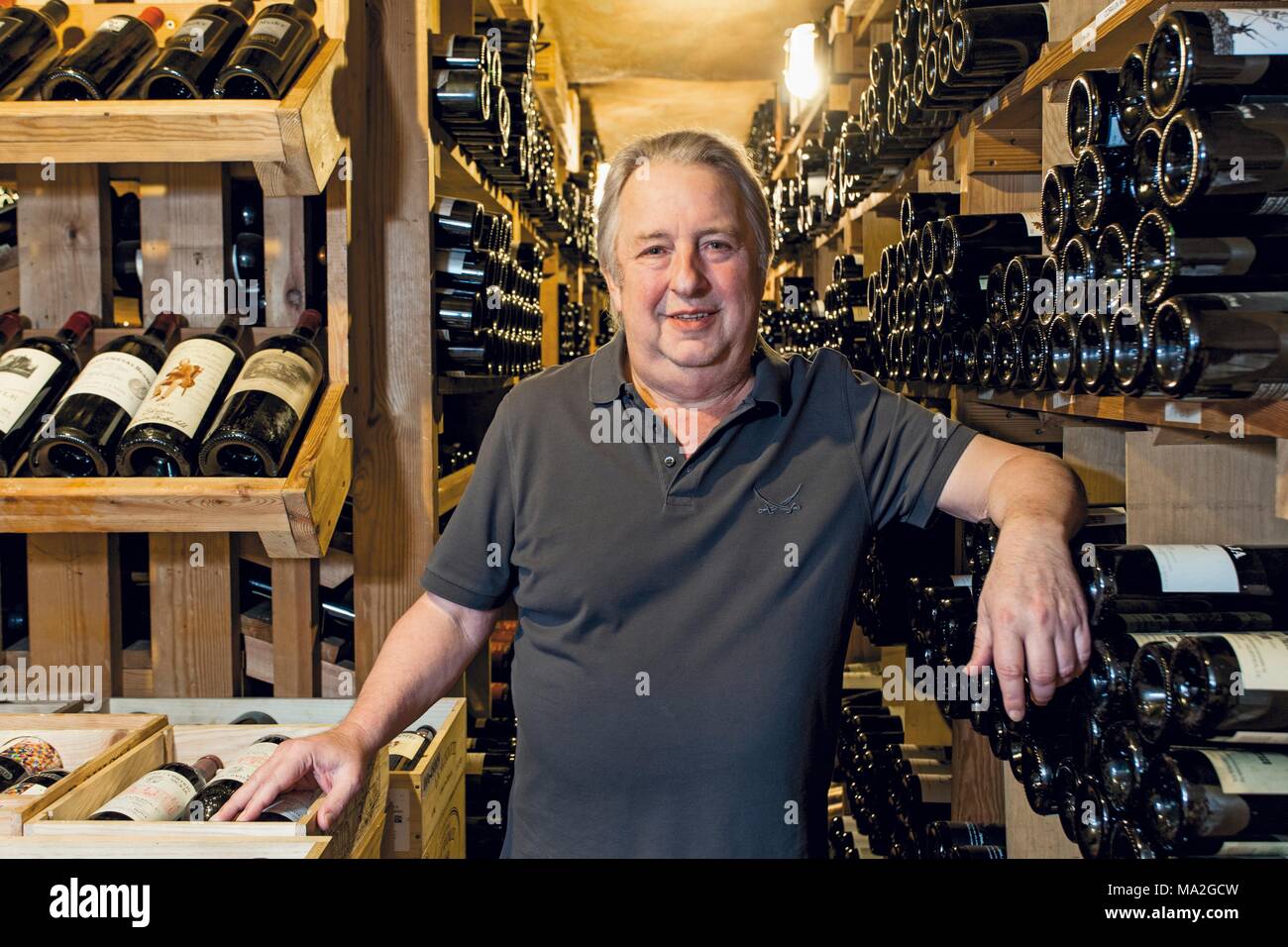 Herbert Seckler in the wine cellar, restaurant Sansibar, Sylt Stock Photo