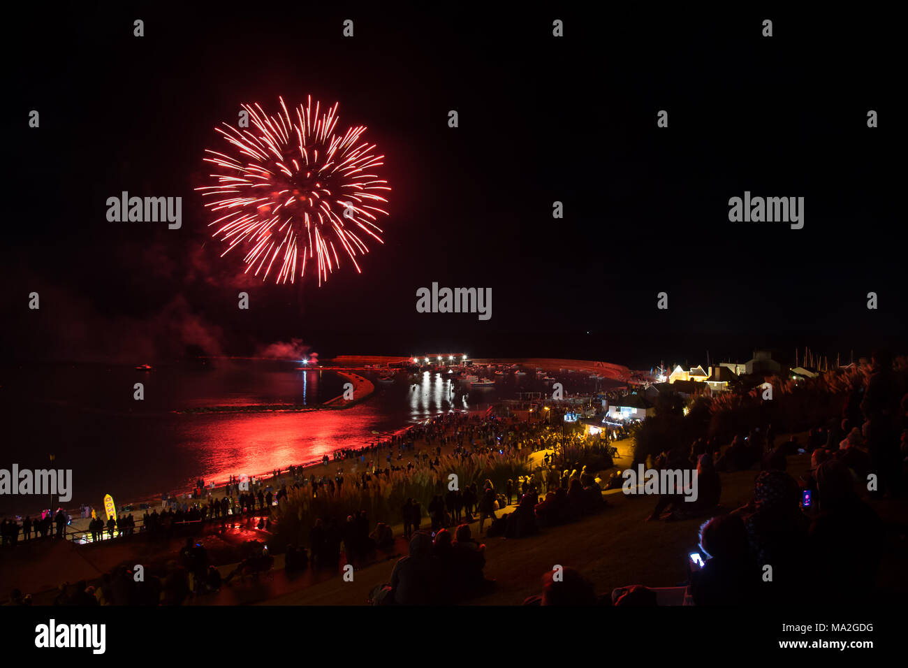Fireworks over the Cobb at Lyme Regis Stock Photo Alamy
