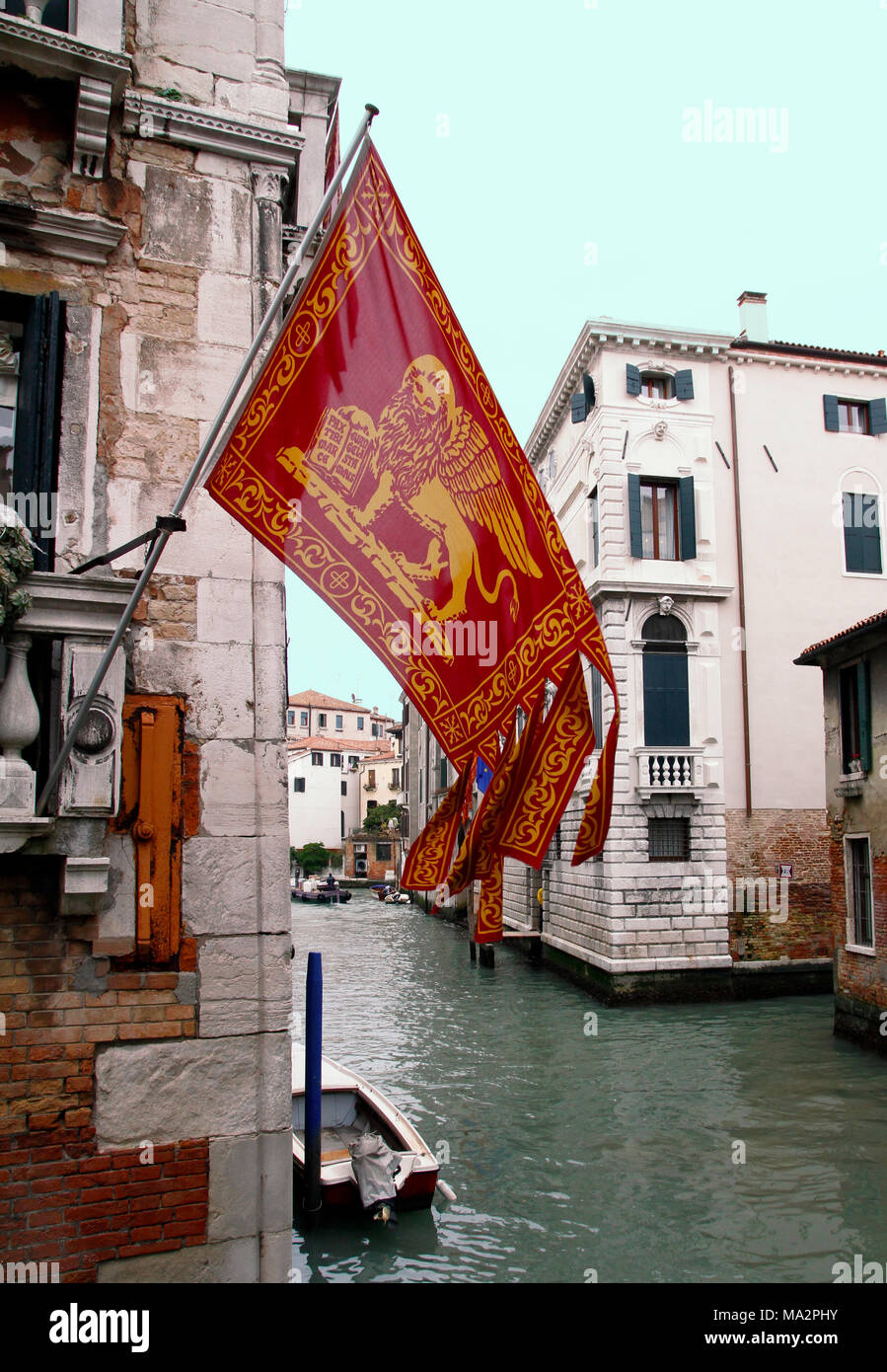 panoramic view of Venice with venetian flag Stock Photo