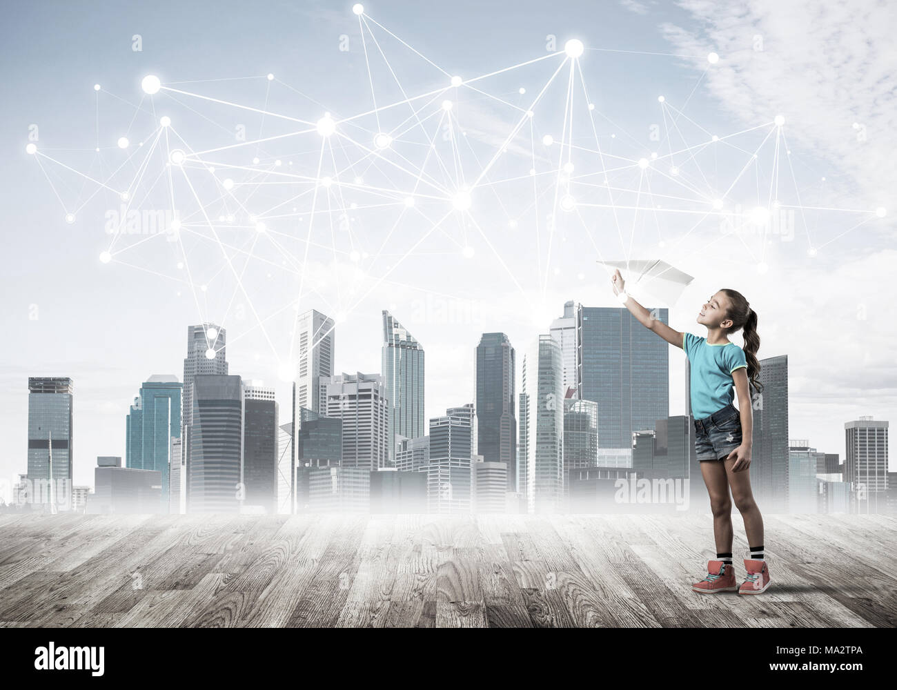 Cute little girl is launching a paper plane, dream about sky Stock ...