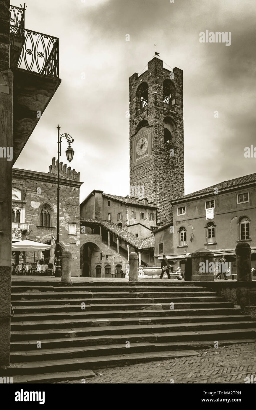 Watching the Campanone in Piazza Vecchia - Bergamo Alta - Italy Stock Photo