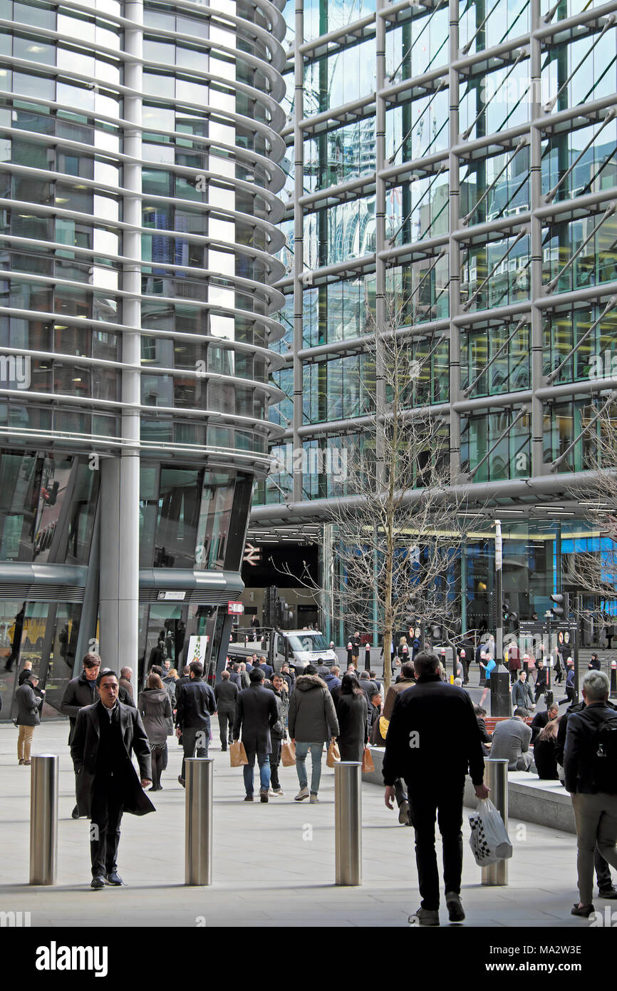 People walking past Walbrook Building and Cannon Street Station outside