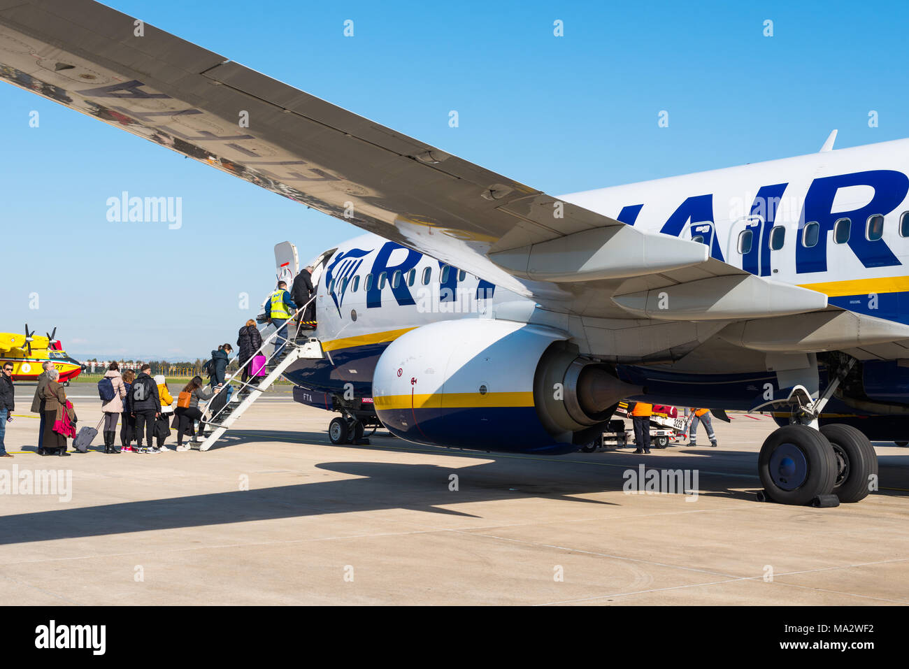 Passengers boarding a Ryanair flight from Rome to London. Stock Photo