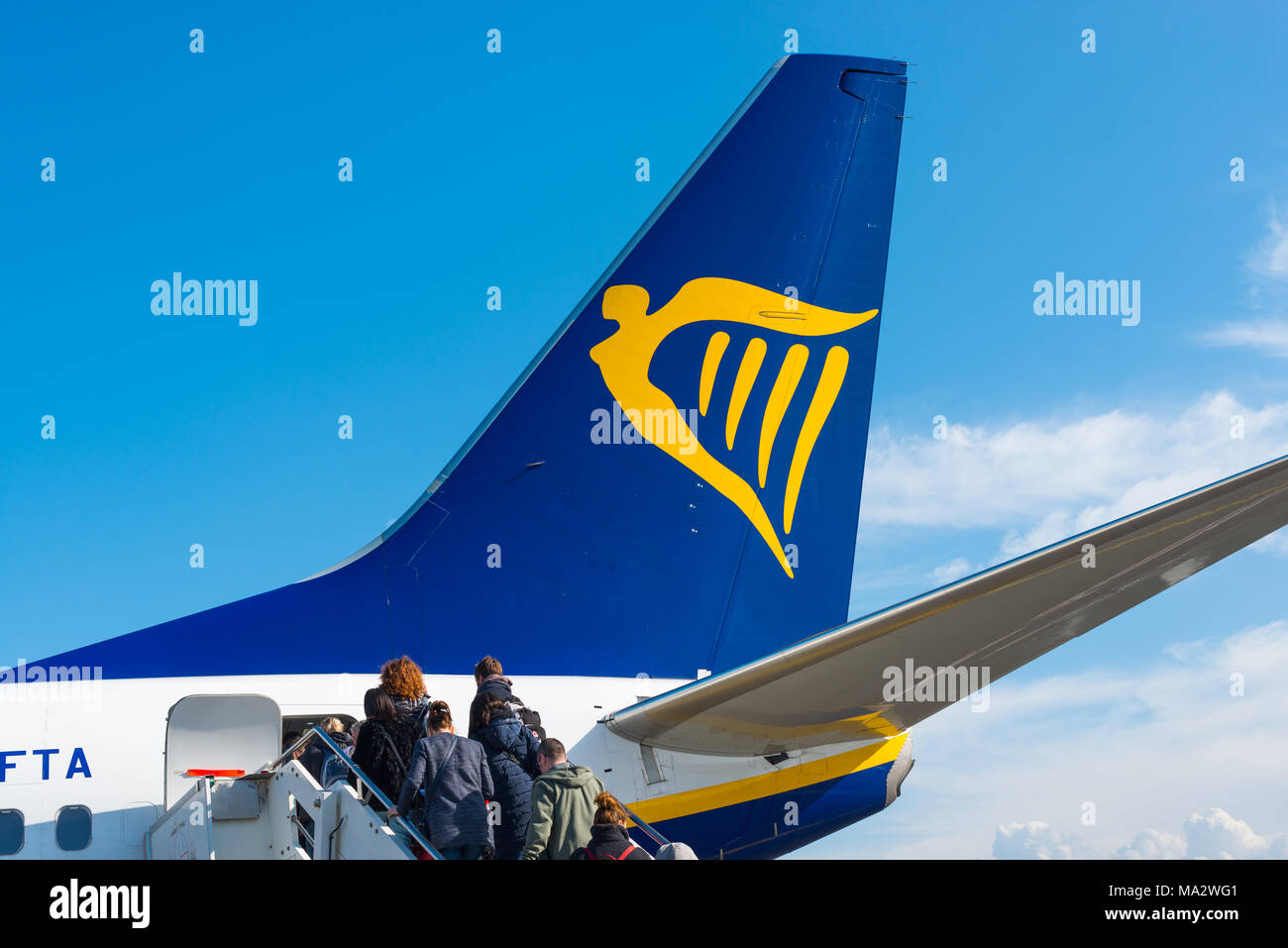 Passengers boarding a Ryanair flight from Rome to London. Stock Photo