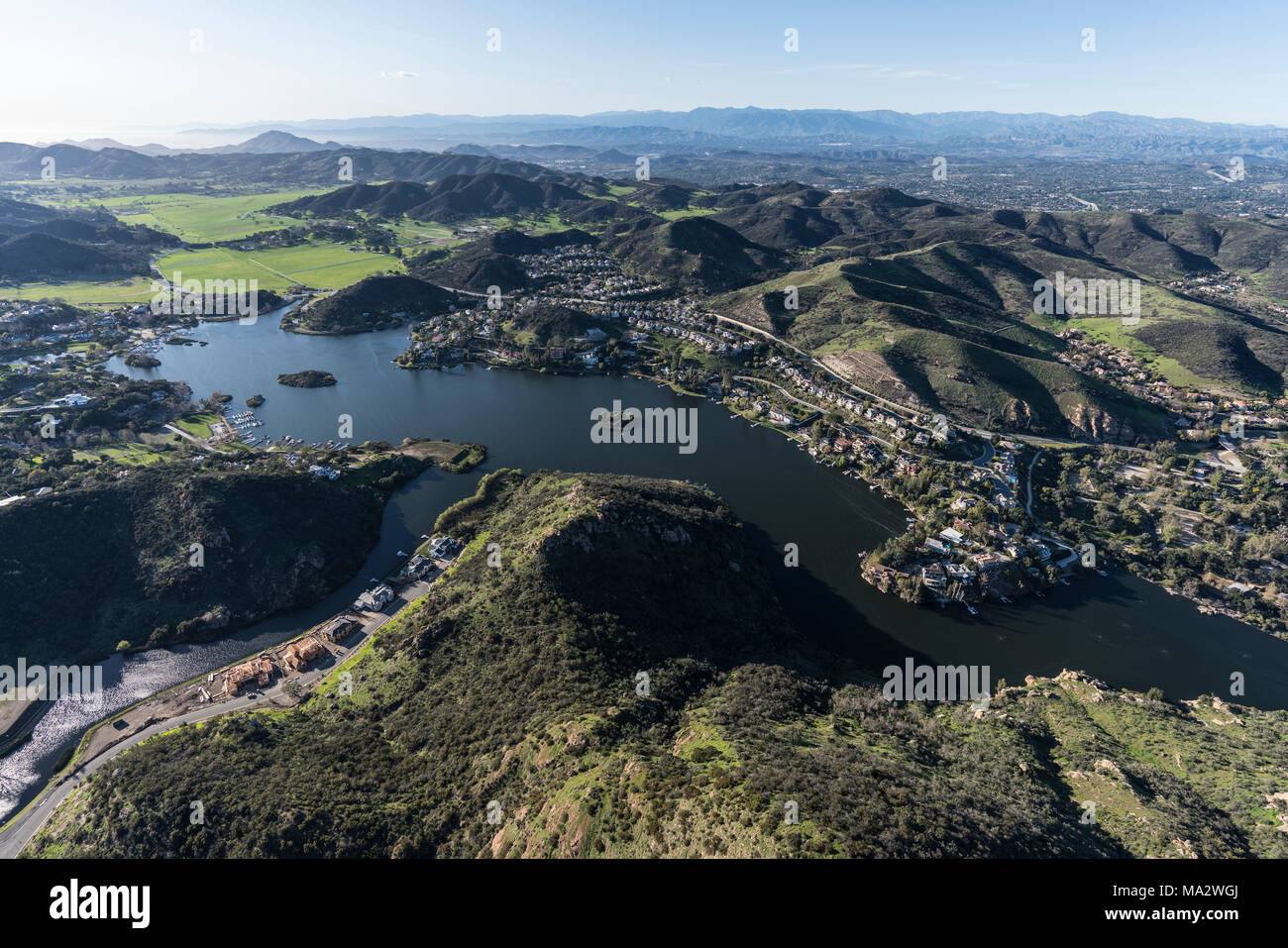 Aerial view of Lake Sherwood, Hidden Valley and the Santa Monica Mountains near Westlake Village, Malibu and Thousand Oaks California. Stock Photo