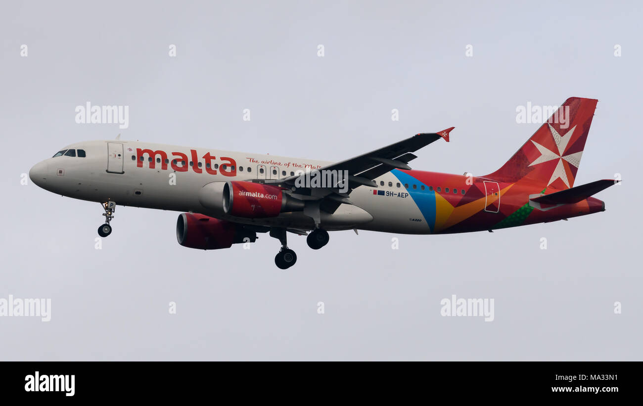 Malta Airlines Airbus A320 arriving at London Heathrow Airport Stock