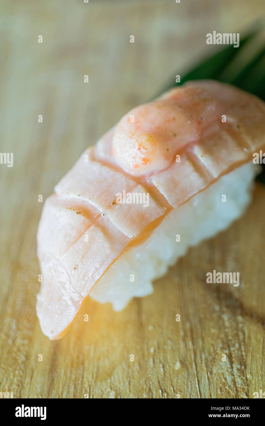 Grilled salmon sushi , japanese food style on wood Stock Photo - Alamy