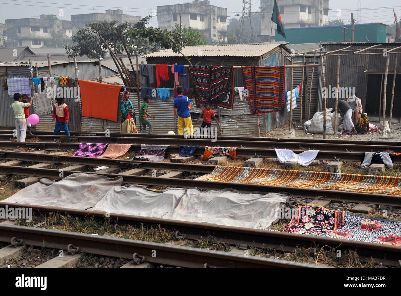 Life between the railway tracks in the station Tongi near Dhaka on 09.01.2015 - Bangladesh