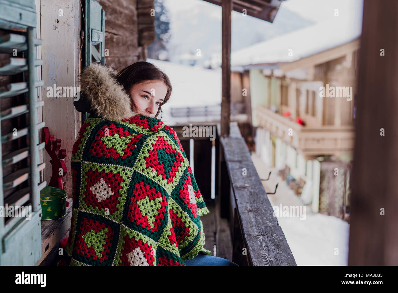Wrapped In A Blanket Sitting On The Balcony High Resolution Stock ...