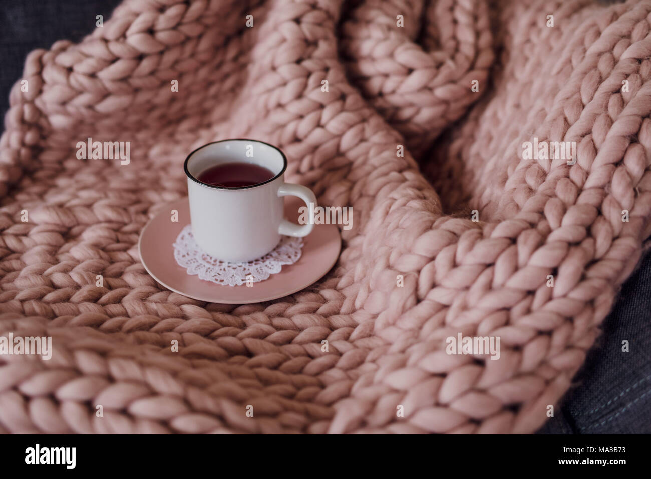Sofa with blanket and teacup,detail, Stock Photo