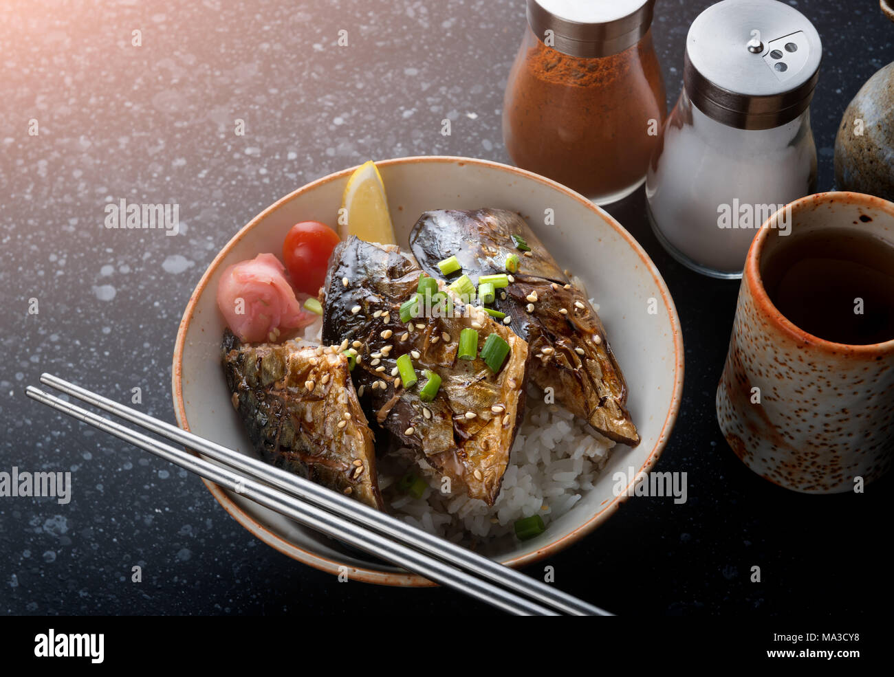 Saba mackerel fish grill with teriyaki sauce on rice in Japanese style Stock Photo Alamy