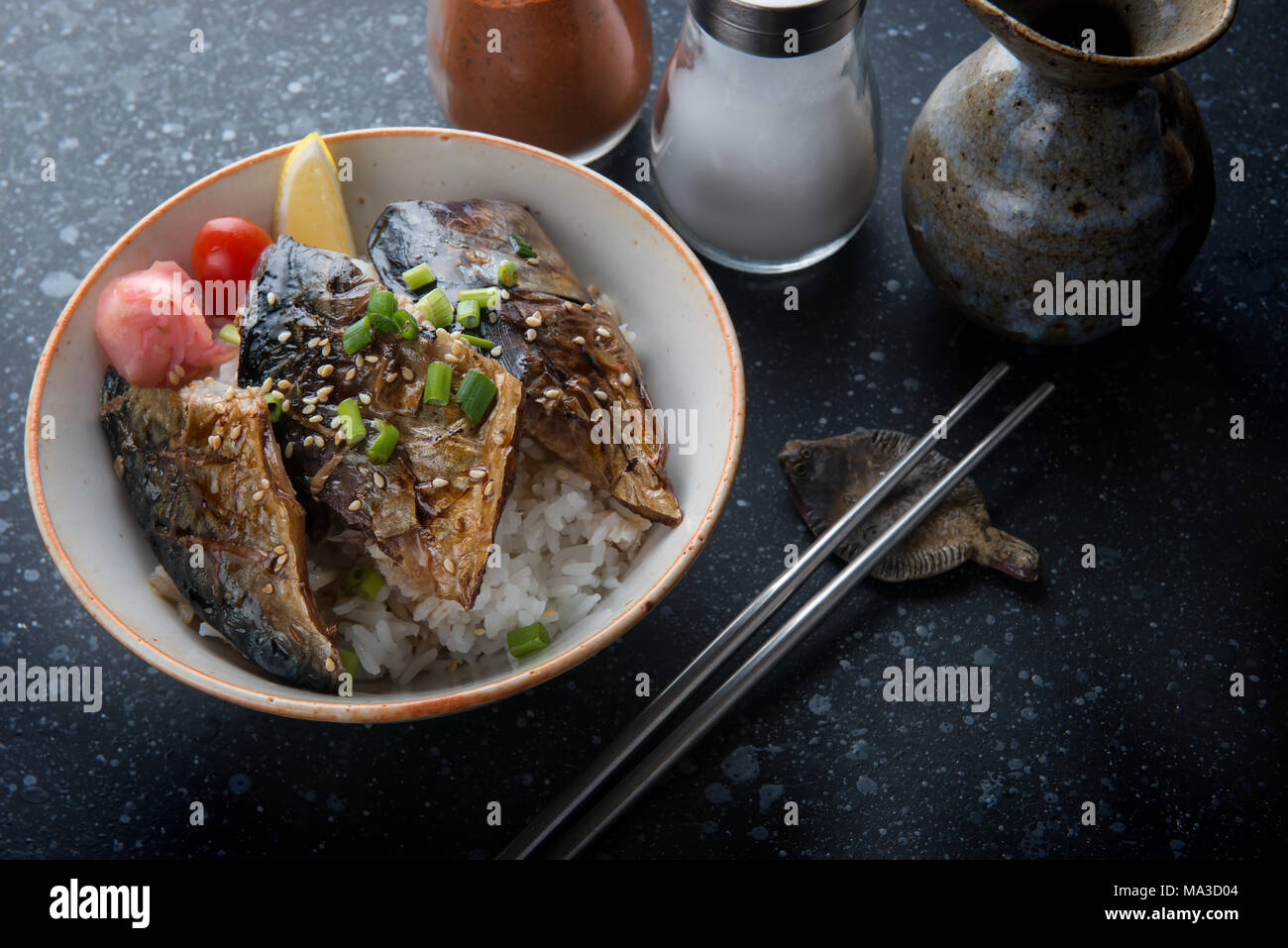 Saba mackerel fish grill with teriyaki sauce on rice in Japanese style Stock Photo Alamy