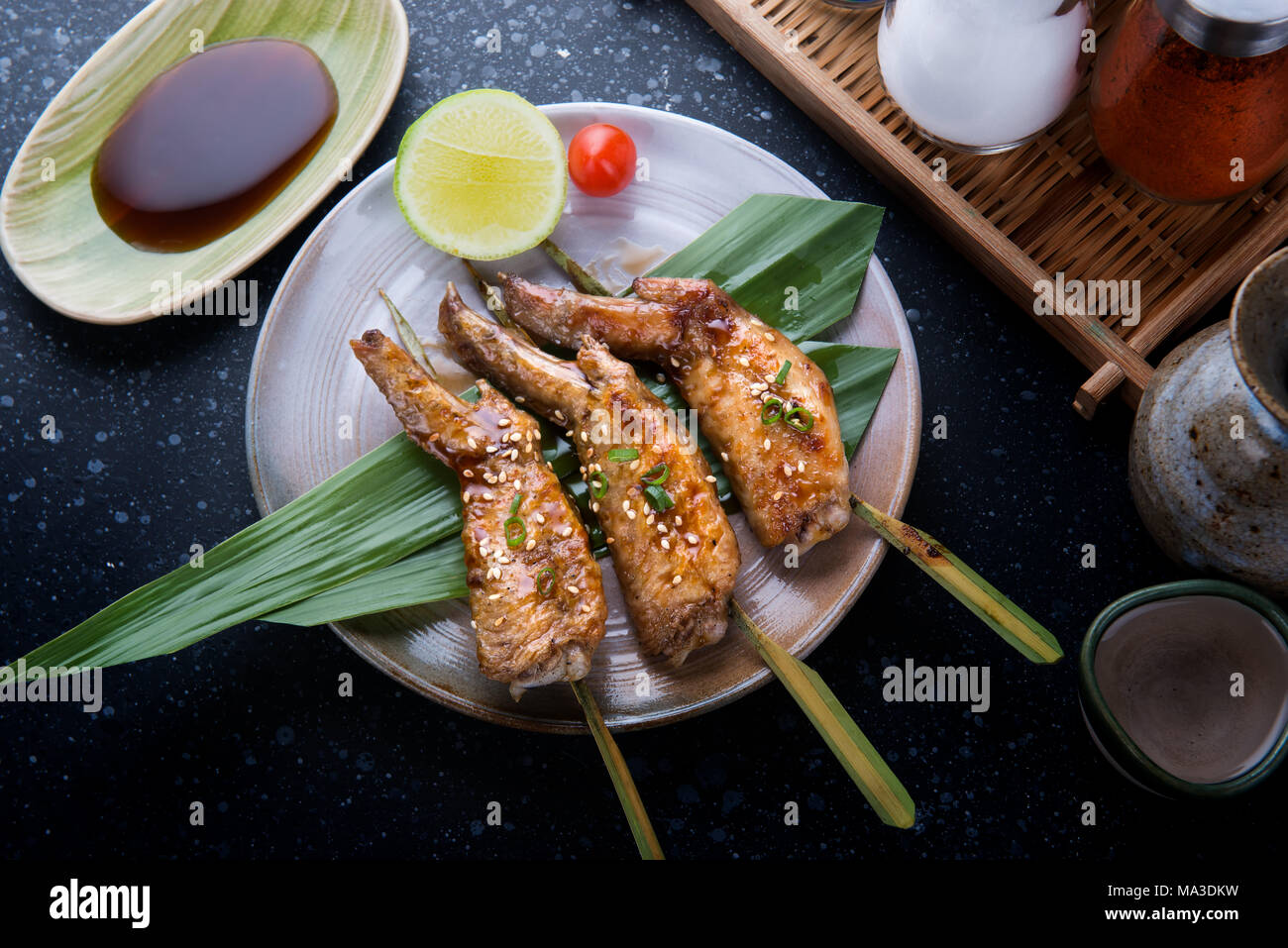 Grilled chicken wings with teriyaki sauce serve in Japanese style skewer  grill food Stock Photo - Alamy