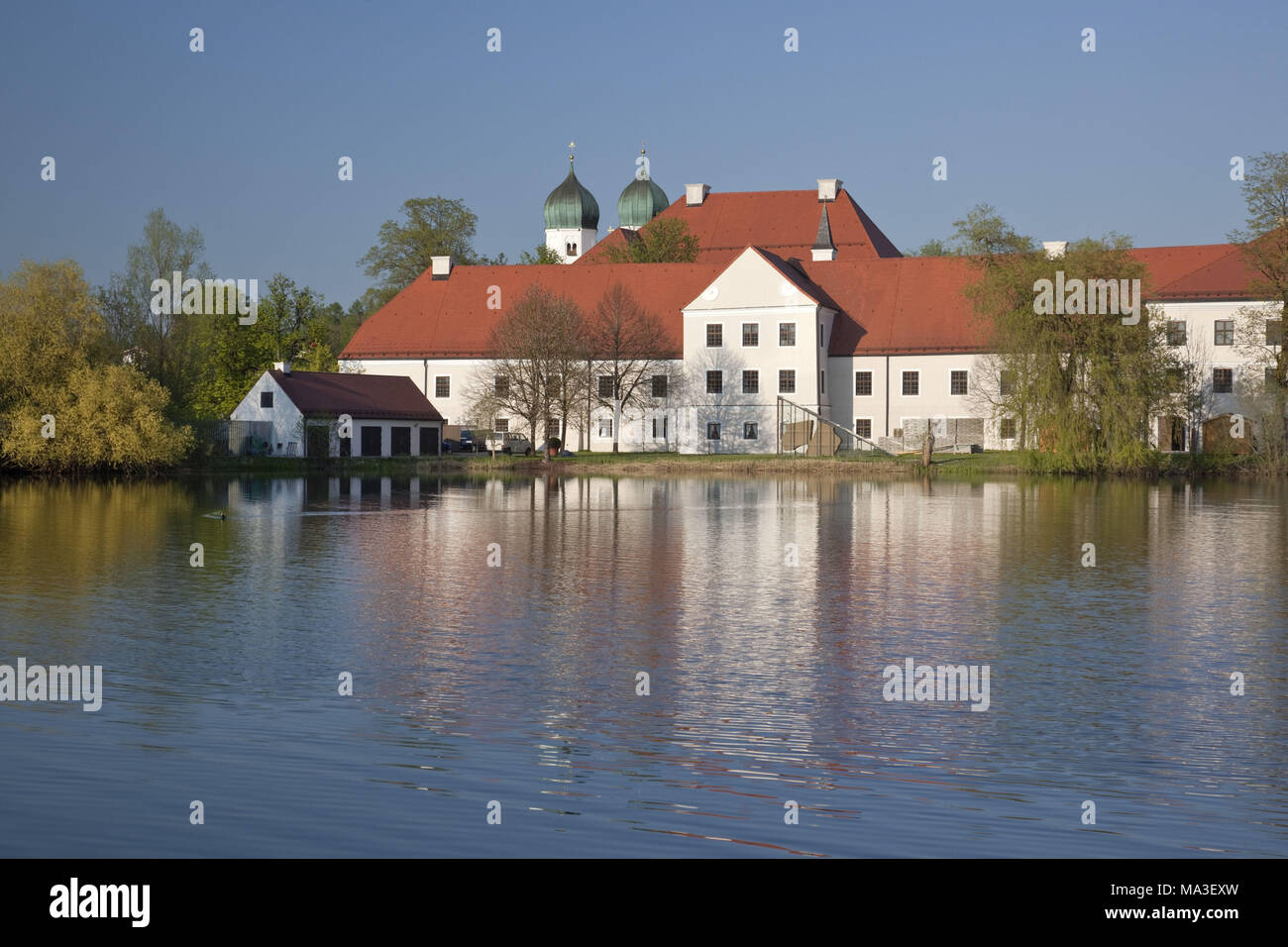 abbey of Seeon in the abbey lake, Chiemgau, Seeon-Seebruck, Upper Bavaria, Bavaria, South Germany, Germany, Stock Photo