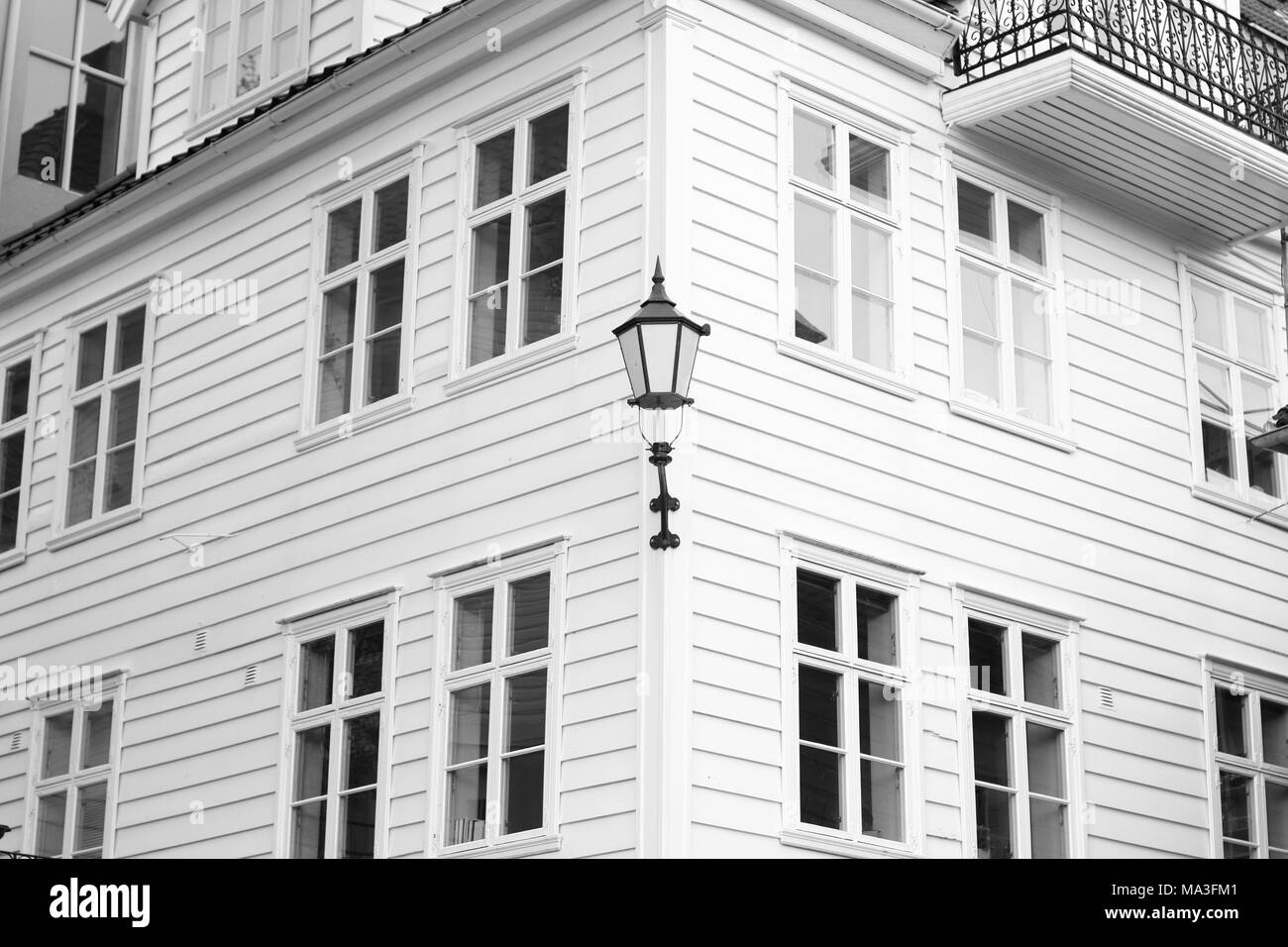 Corner of a house with lamp Stock Photo