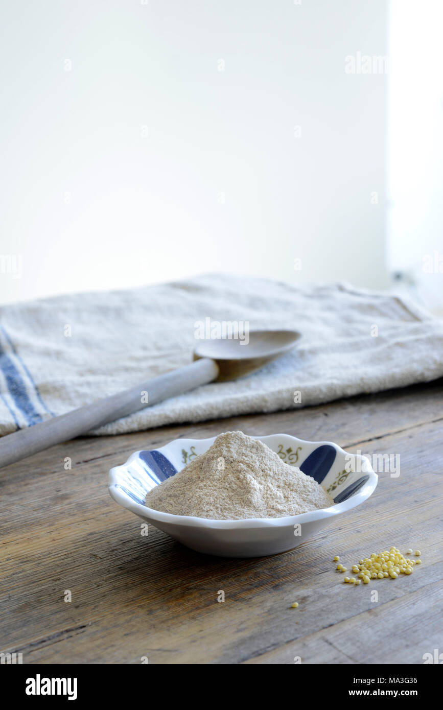 Teff flour, baking ingredients, flour, peel, heap Stock Photo
