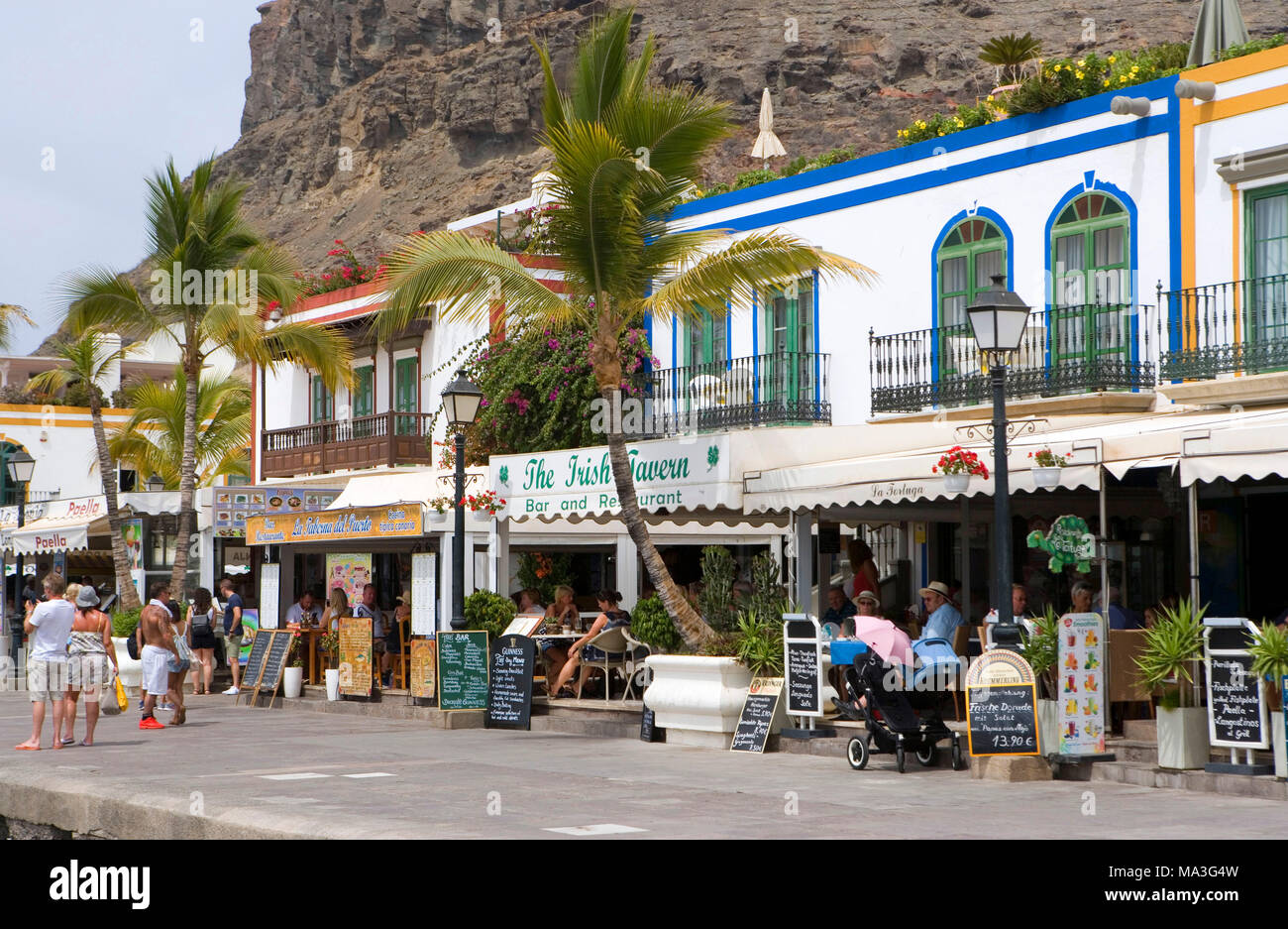 Puerto de Mogan, small harbour town in the extreme southwest of the island, promenade with cafés and snazzy bars Stock Photo
