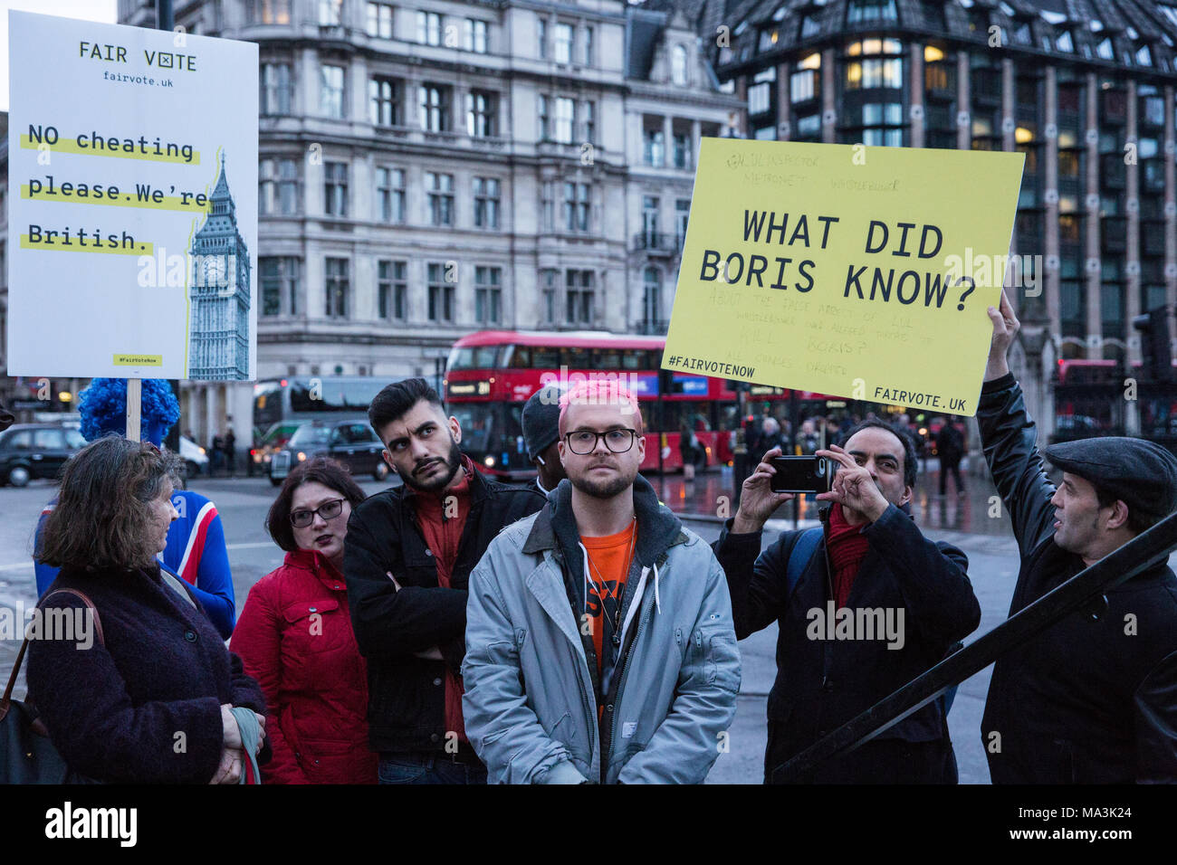 London, UK. 29th March, 2018. Cambridge Analytica whistleblower Christopher Wylie and Vote Leave whistleblower Shahmir Sanni wait to address a rally in Parliament Square organised by the Fair Vote Project, which was set up to support whistleblowers like him and Shahmir Sanni and to ensure that evidence of unfair voting by either side in the referendum regarding the UK’s membership of the European Union is exposed. Credit: Mark Kerrison/Alamy Live News Stock Photo