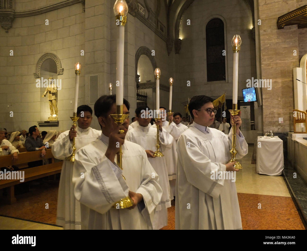 Manila Philippines 27th Mar 2012 Members Of The Knights Of The Altar With Lighted Candles Entered The Altar Marking The Start Of The Maundy Thursday Mass Cardinal Tagle Officiates The Maundy Thursday Washing