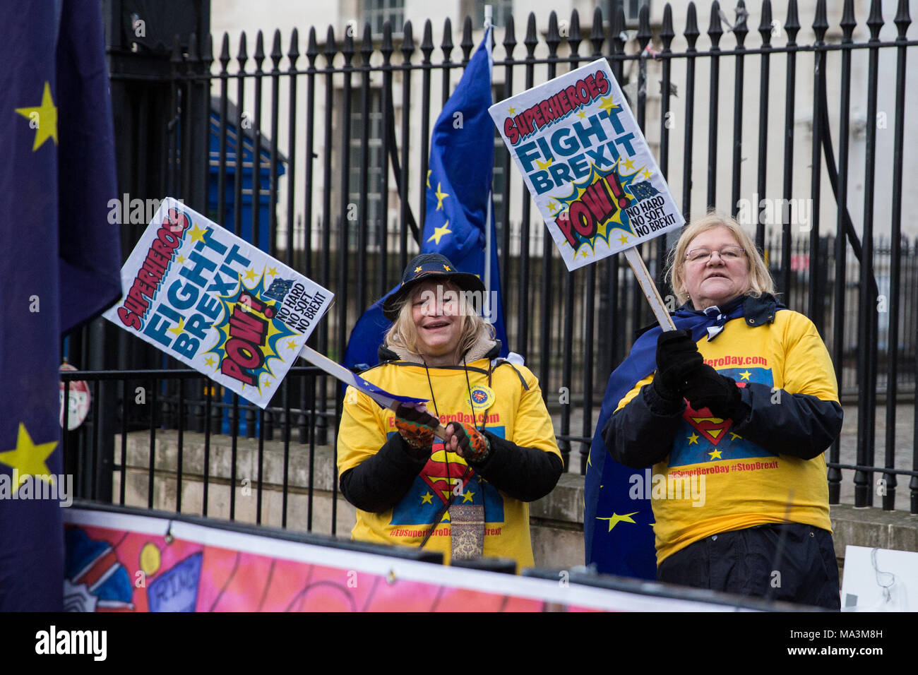 London, UK. 29th March, 2018. Pro-EU activists protest opposite Downing Street to mark the first anniversary of the triggering of Article 50 and a year before the UK’s exit from the European Union, or Brexit, is scheduled to take place. Protesters dressed as ‘EU super heroes’ and ‘Brexit villains’. Credit: Mark Kerrison/Alamy Live News Stock Photo