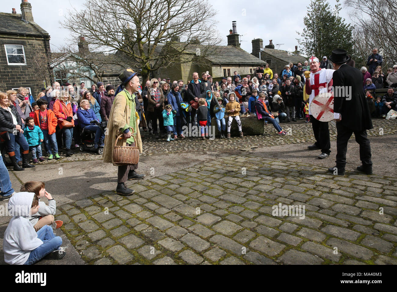 Heptonstall, UK. 30th March, 2018. The Heptonstall Players entertain with the annual traditional Pace Egg Play taking place throughout Good Friday in the historical village of Heptonstall, 30th March, 2018 (C)Barbara Cook/Alamy Live News Stock Photo