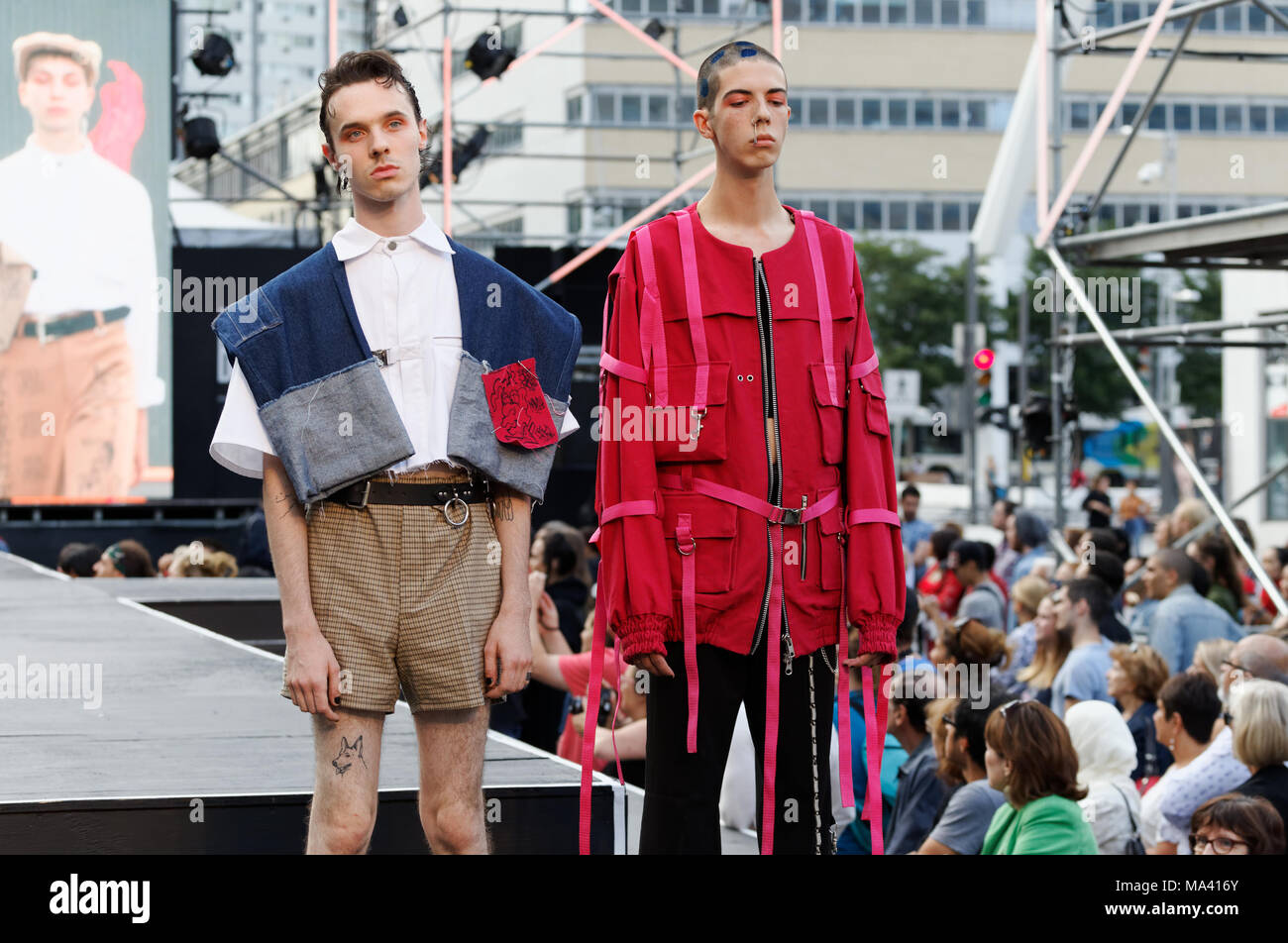 Montreal,Canada. Two male models pose on the runway at the  Nancy VTMT  fashion show, featuring Quebec City designers held during the Fashion and Desi Stock Photo