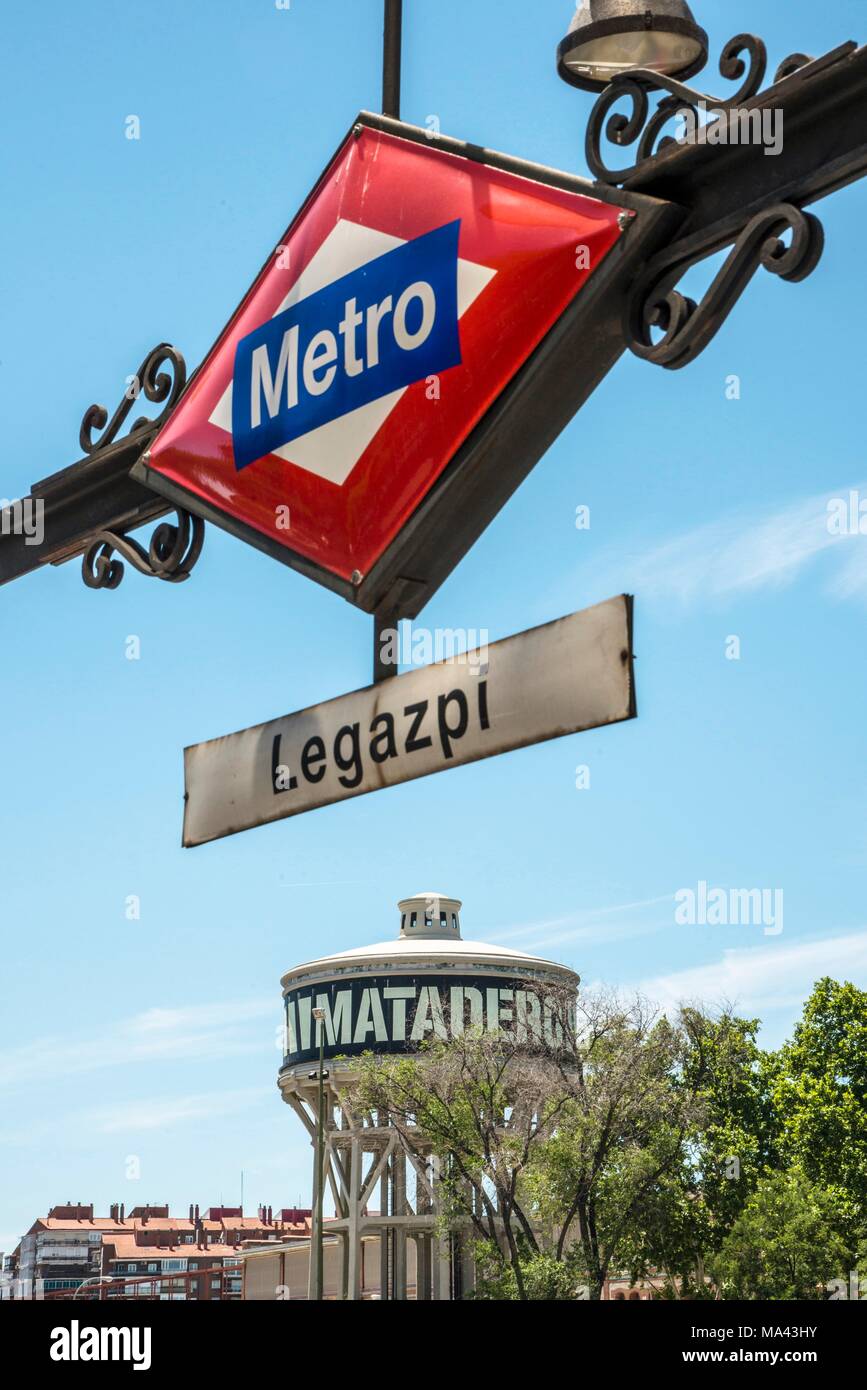 The water tower and Metro sign in front of the Matadero cultural centre in Madrid, Spain Stock Photo