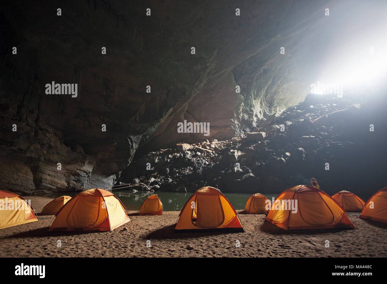 Expedition: tents in the Hang En cave in the Phong Nha-Ke Bang National Park in Vietnam Stock Photo