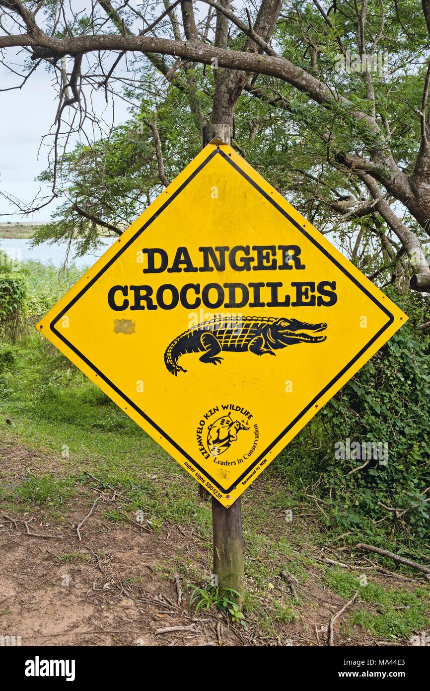 Danger Sign Warning Of Crocodiles Stock Photos & Danger Sign Warning Of