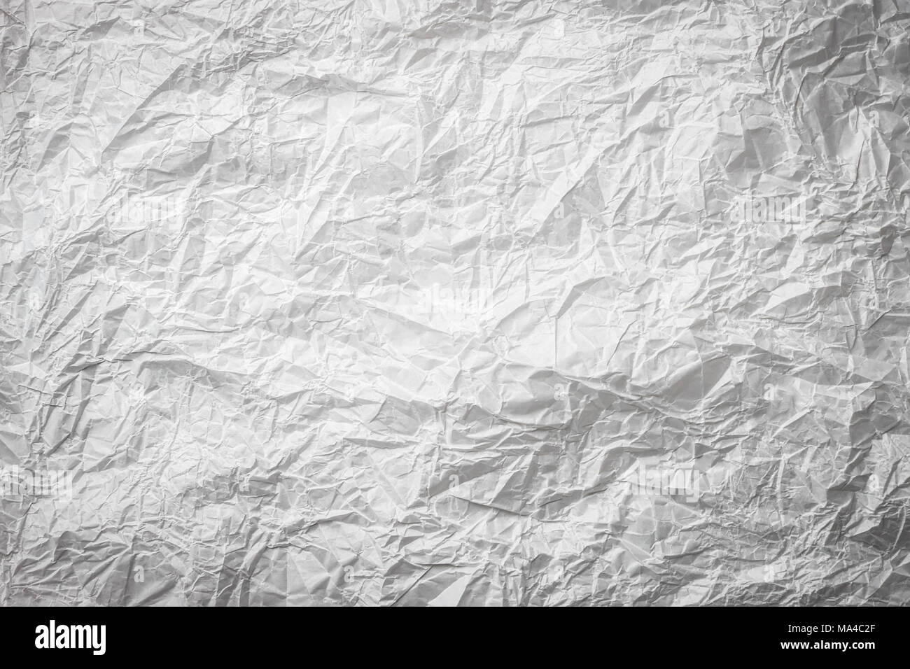 Background Of Crumpled White Gray Monochrome Bakery Paper Textured