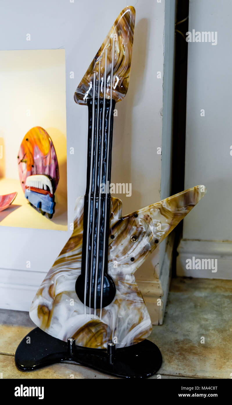 A guitar made of glass. Maltese glass hand crafting. Stock Photo