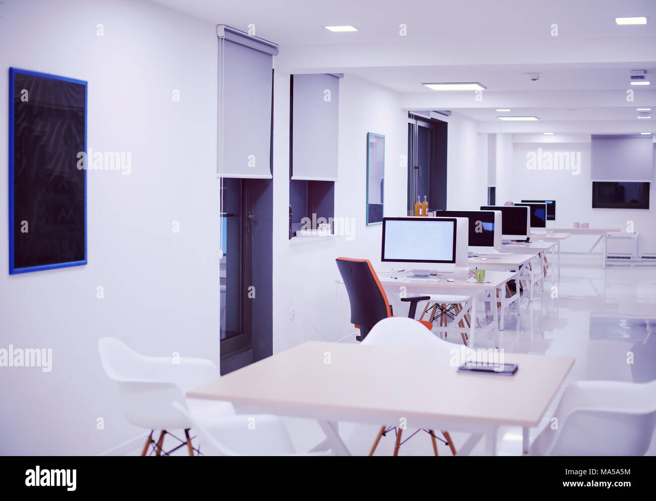 Empty Startup Office Interior With Modern Computers And