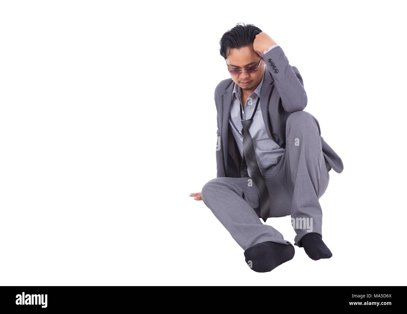 stressed businessman touching his head and thinking isolated on white background Stock Photo