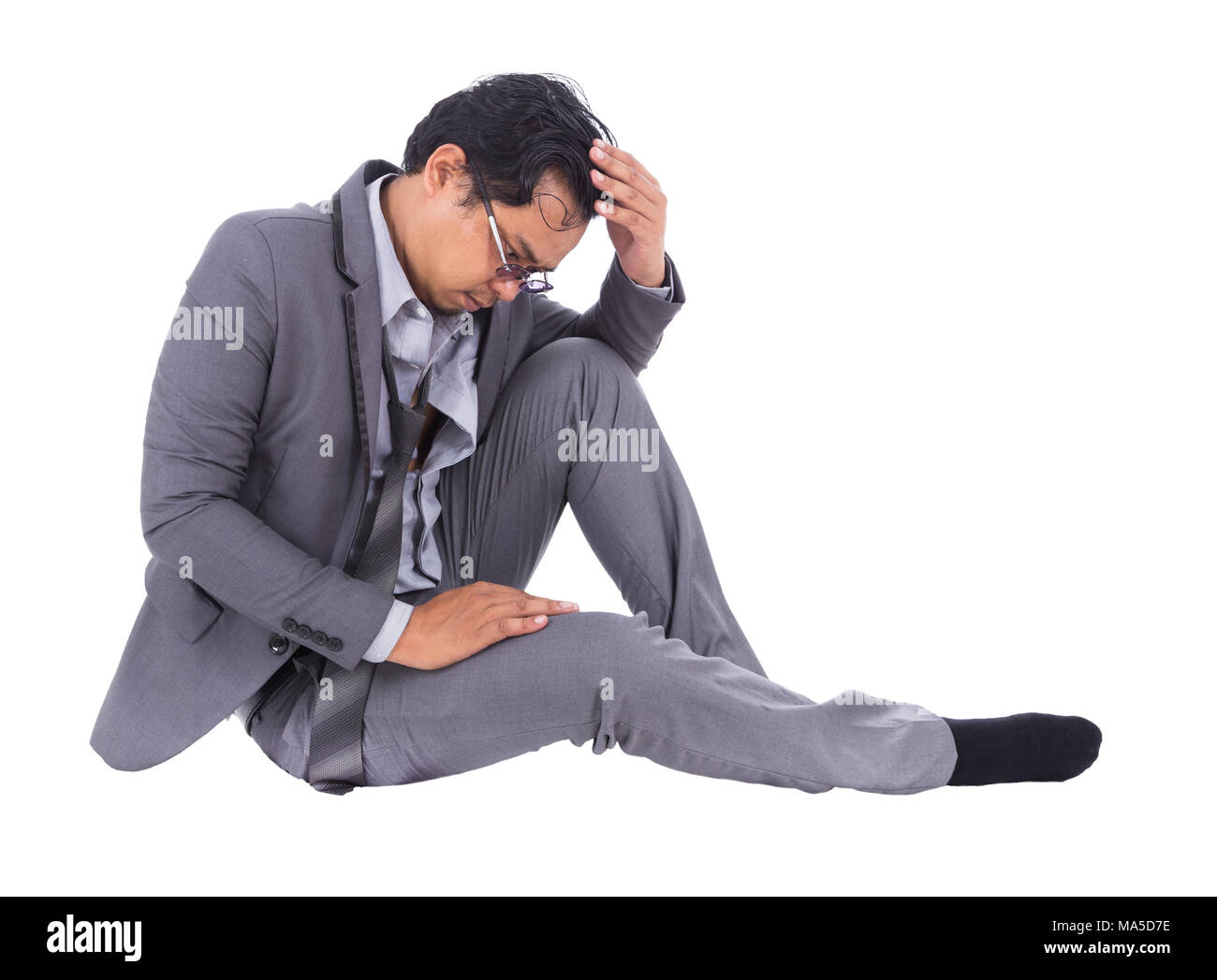 stressed businessman touching his head and thinking isolated on white background Stock Photo