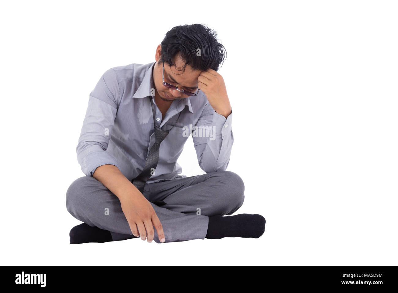 stressed businessman touching his head and thinking isolated on white background Stock Photo