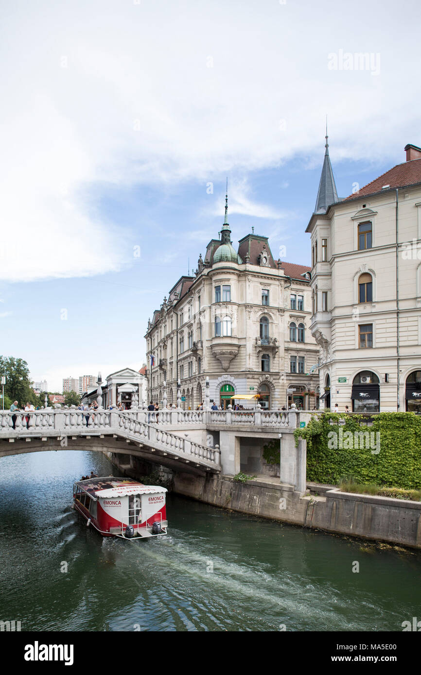 Excursion boat at the Three Bridges in Ljubljana, Slovenia Stock Photo