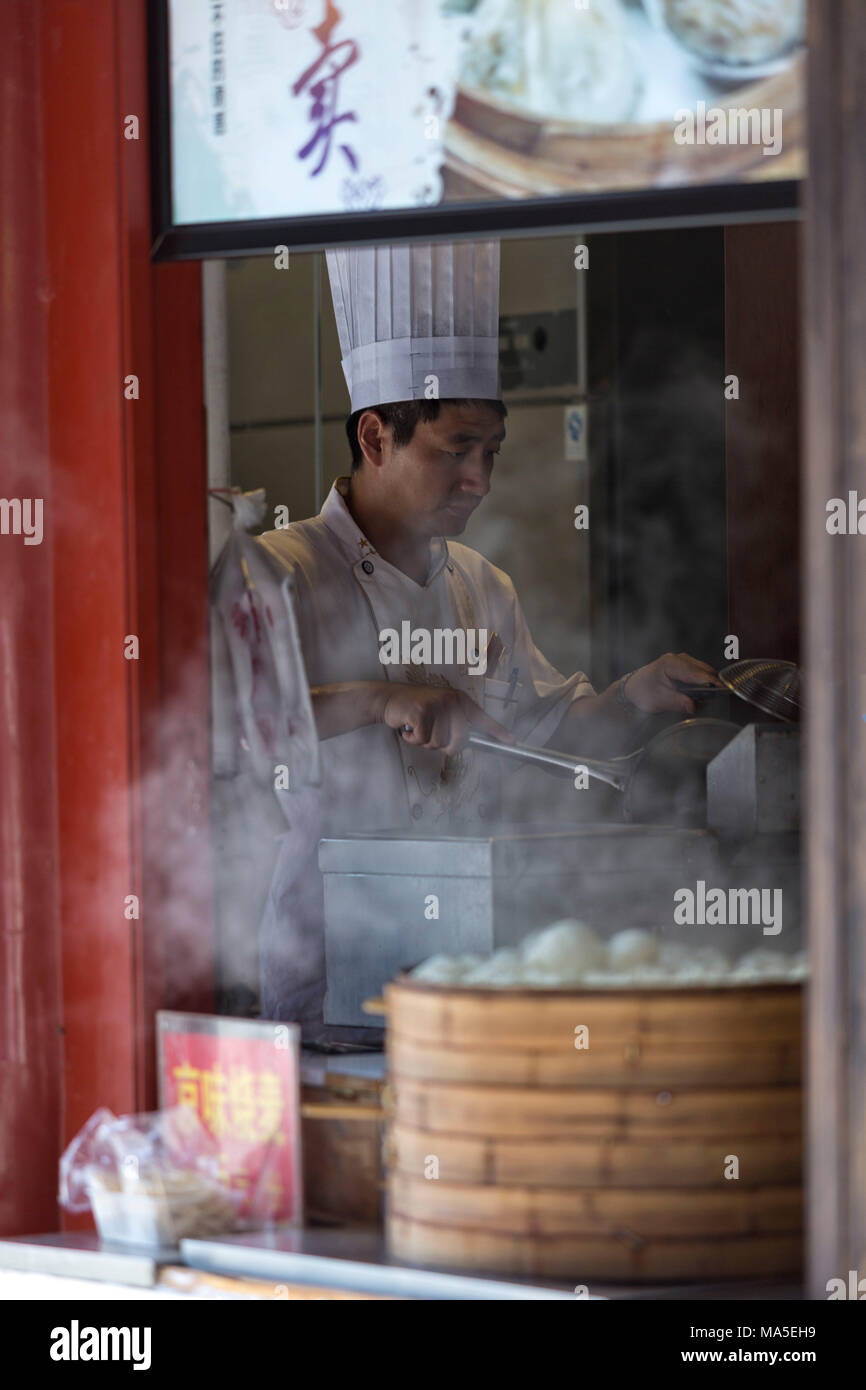 Asia,Asian,East Asia,China,Beijing.Chinese cook Stock Photo