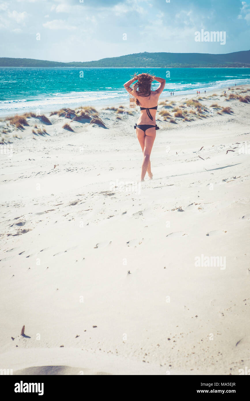 Woman Standing On Sand Beach Is Arenas Biancas Teulada