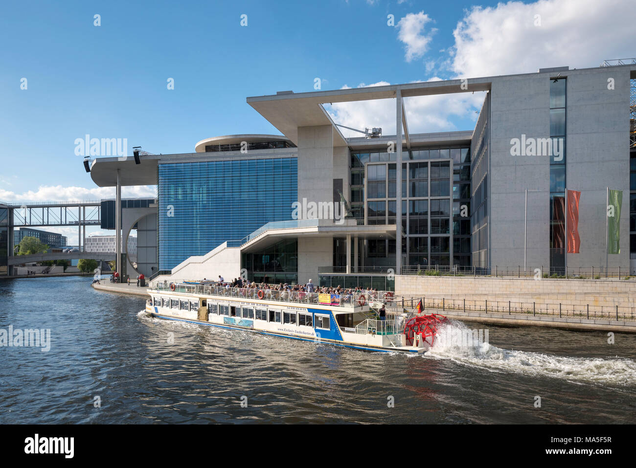 The ferryboat is crossing the Government District in Berlin, Germany, Europe Stock Photo