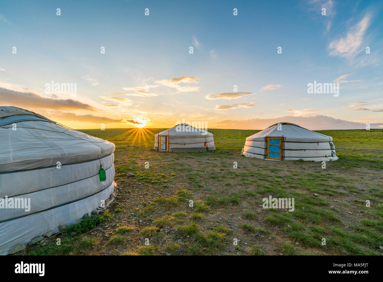 Mongolian nomadic traditional gers while the sun sets. Middle Gobi province, Mongolia. Stock Photo