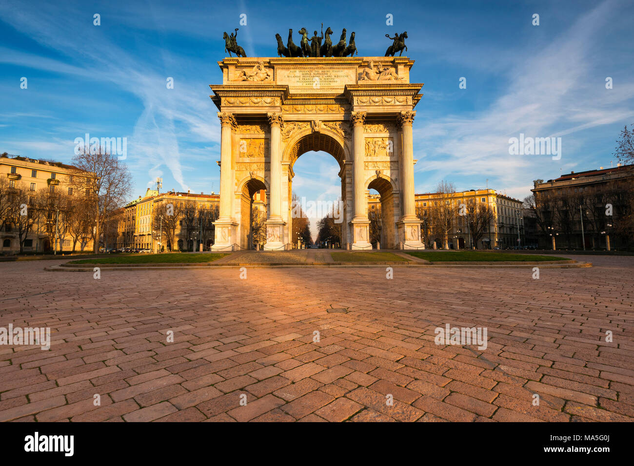 Milan, Lombardy, Italy. Porta Sempione or Arco della Pace at sunrise Stock Photo