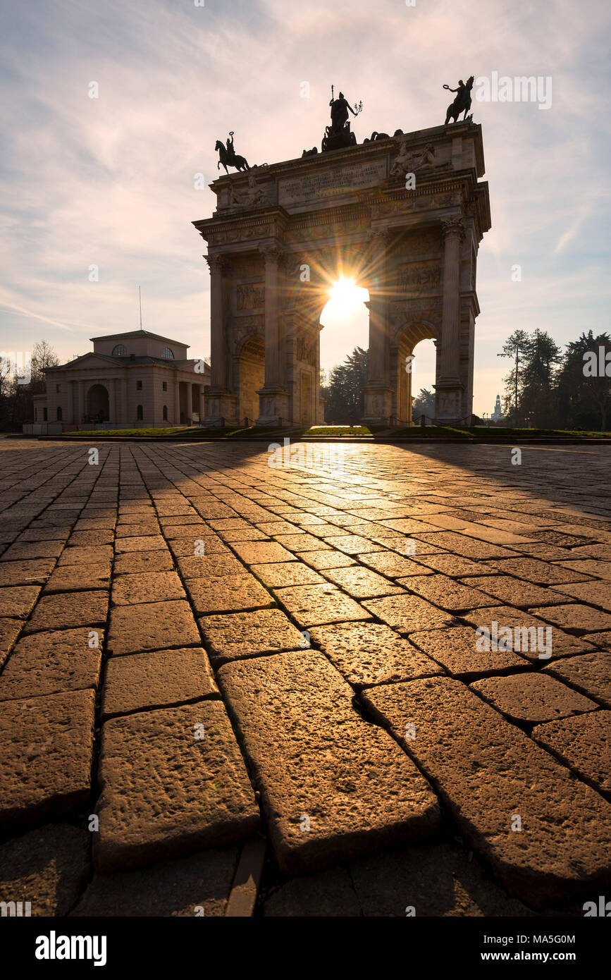 Milan, Lombardy, Italy. Porta Sempione or Arco della Pace at sunrise Stock Photo