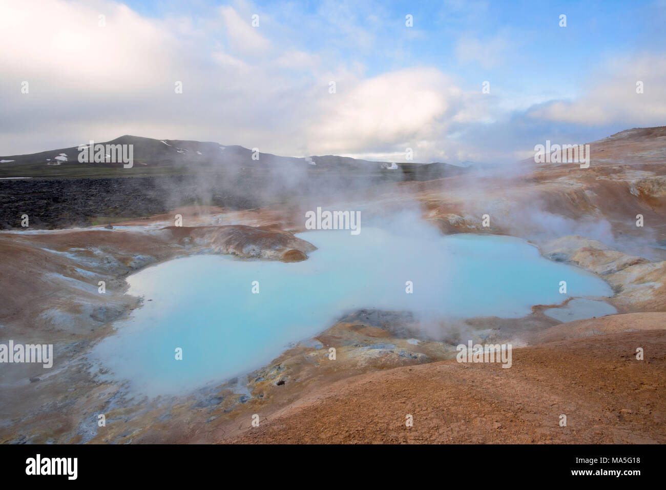 Smoking sulfur hotpool, Hverir Geothermal Area,Norðurland eystra, Iceland, Europe. Stock Photo