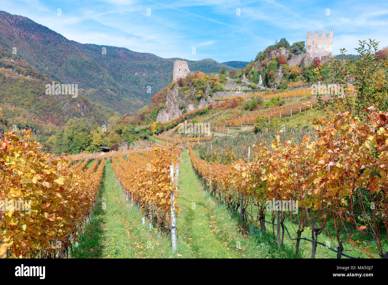 View of Cembra Valley in autumn and Segonzano Castle, Trentino District, Italy Stock Photo