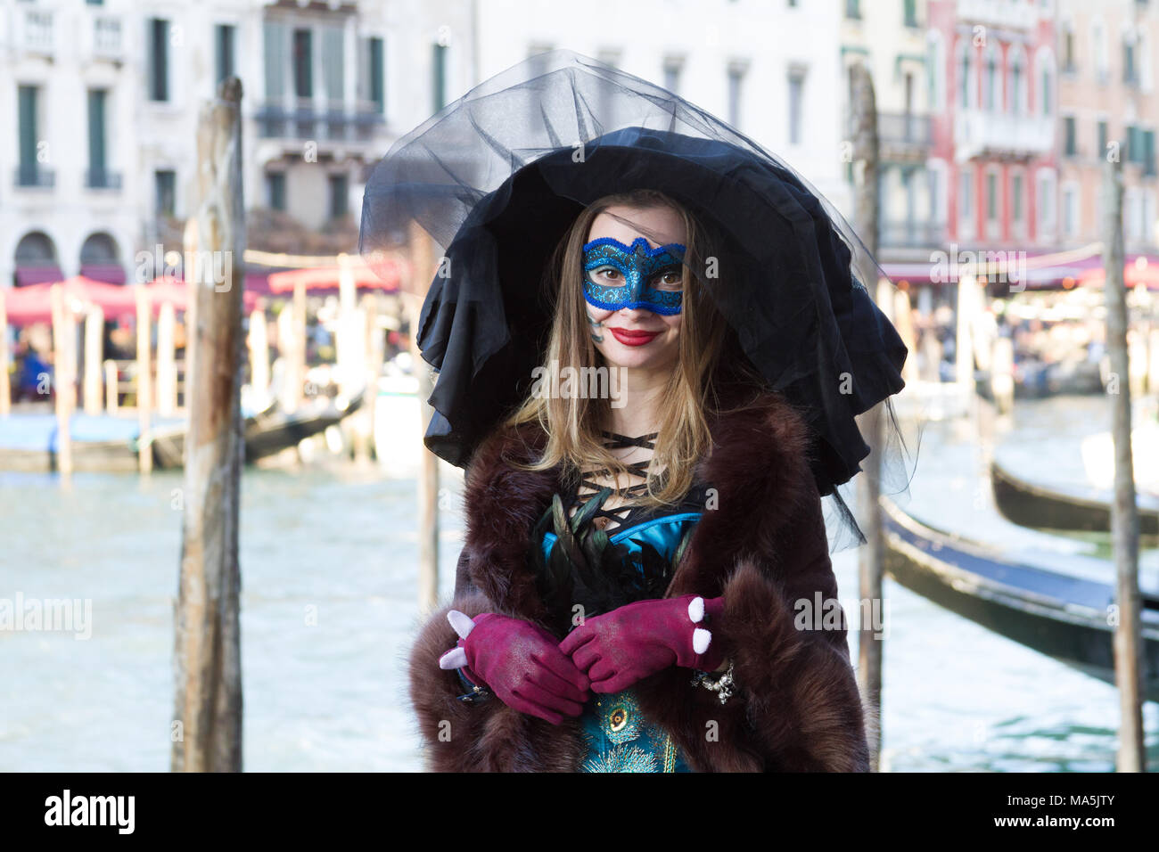 Venezia (Venice), Italy. 2 February 2018. A young woman in a costume and mask at the carnival in Venice. Stock Photo