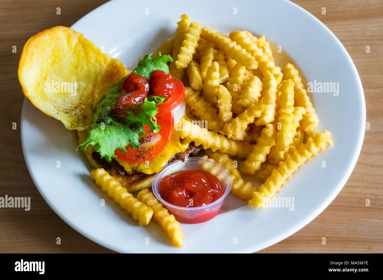 A Shake Shack cheeseburger and fries takeaway meal Stock Photo