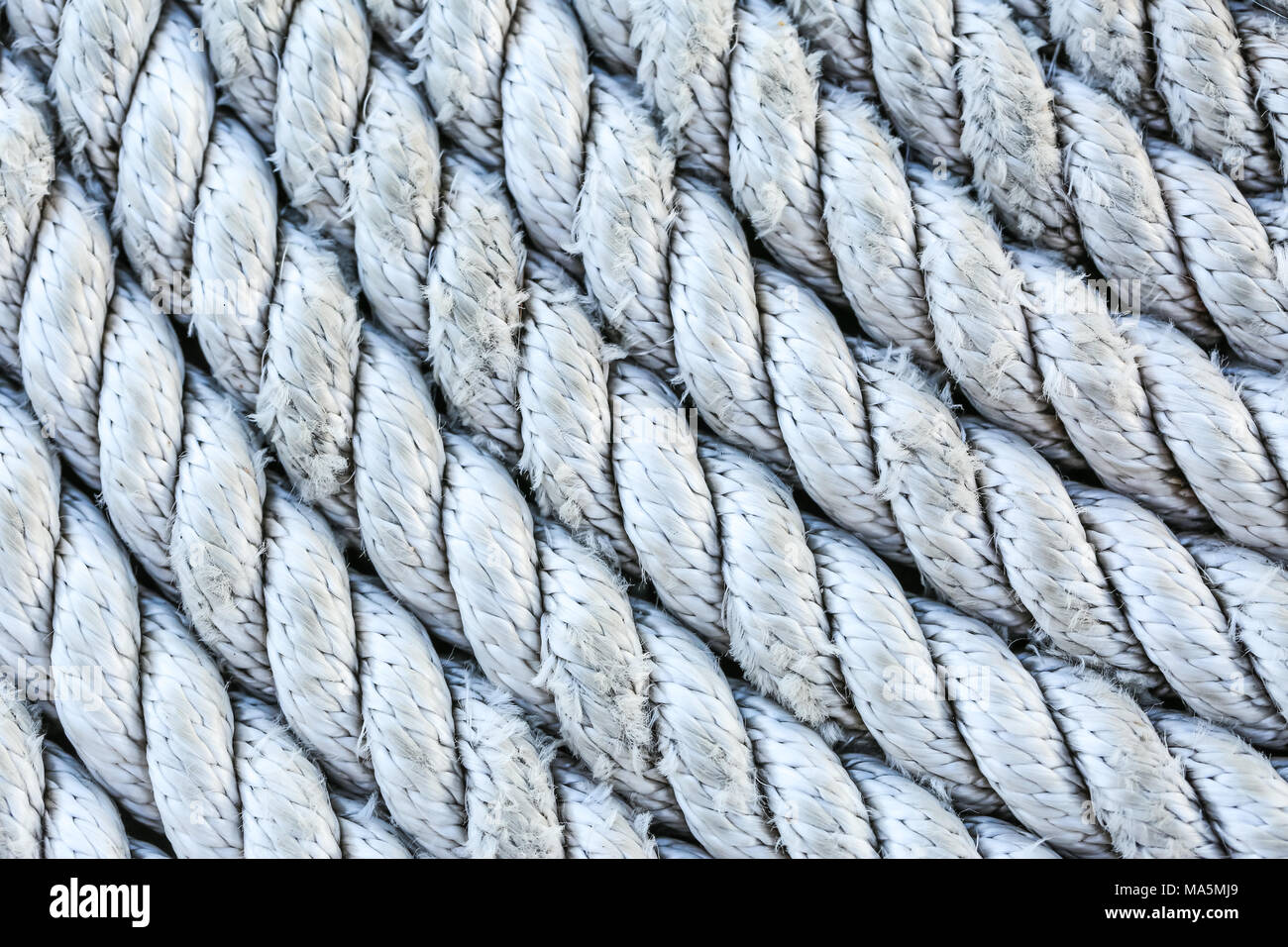 Rope folded into a spiral Stock Photo - Alamy