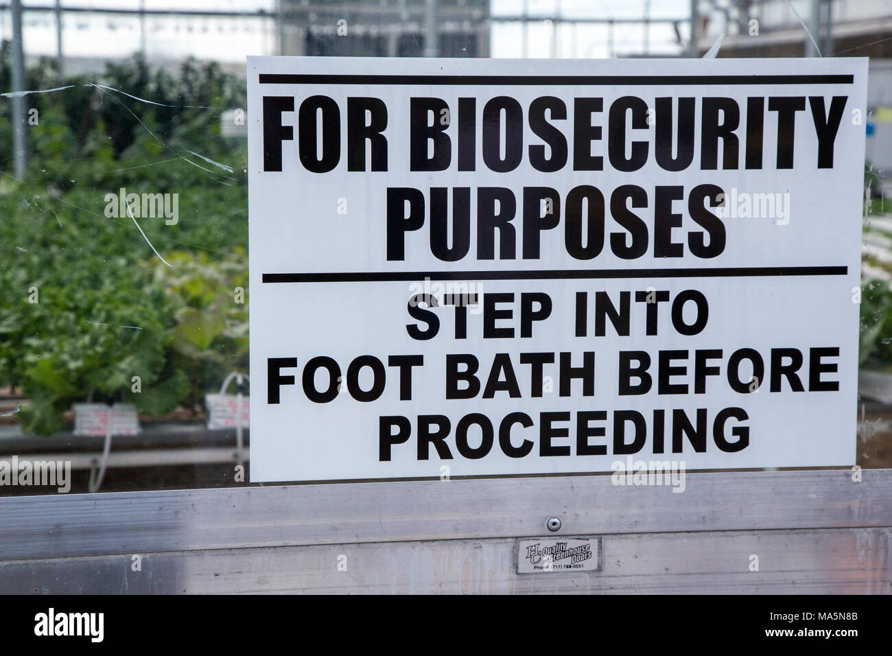 Hydroponic Agriculture.  Biosecurity Contamination Warning Sign.  Dyersville, Iowa, USA. Stock Photo
